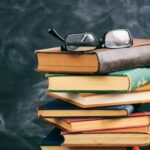 reading-glasses-on-a-stack-of-books.jpg.optimal.jpg