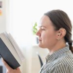 deaf-person-reading-hearing-aid.jpg.optimal.jpg
